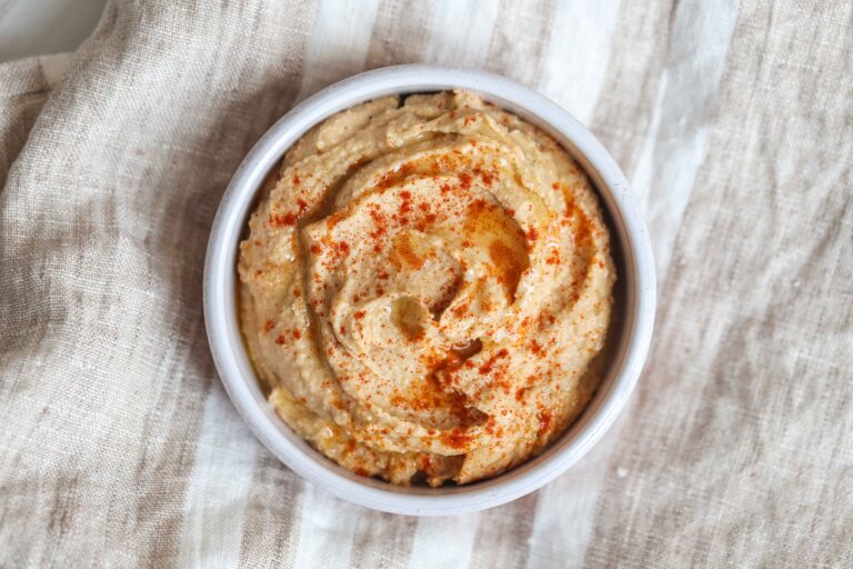 classic hummus on a white tablecloth